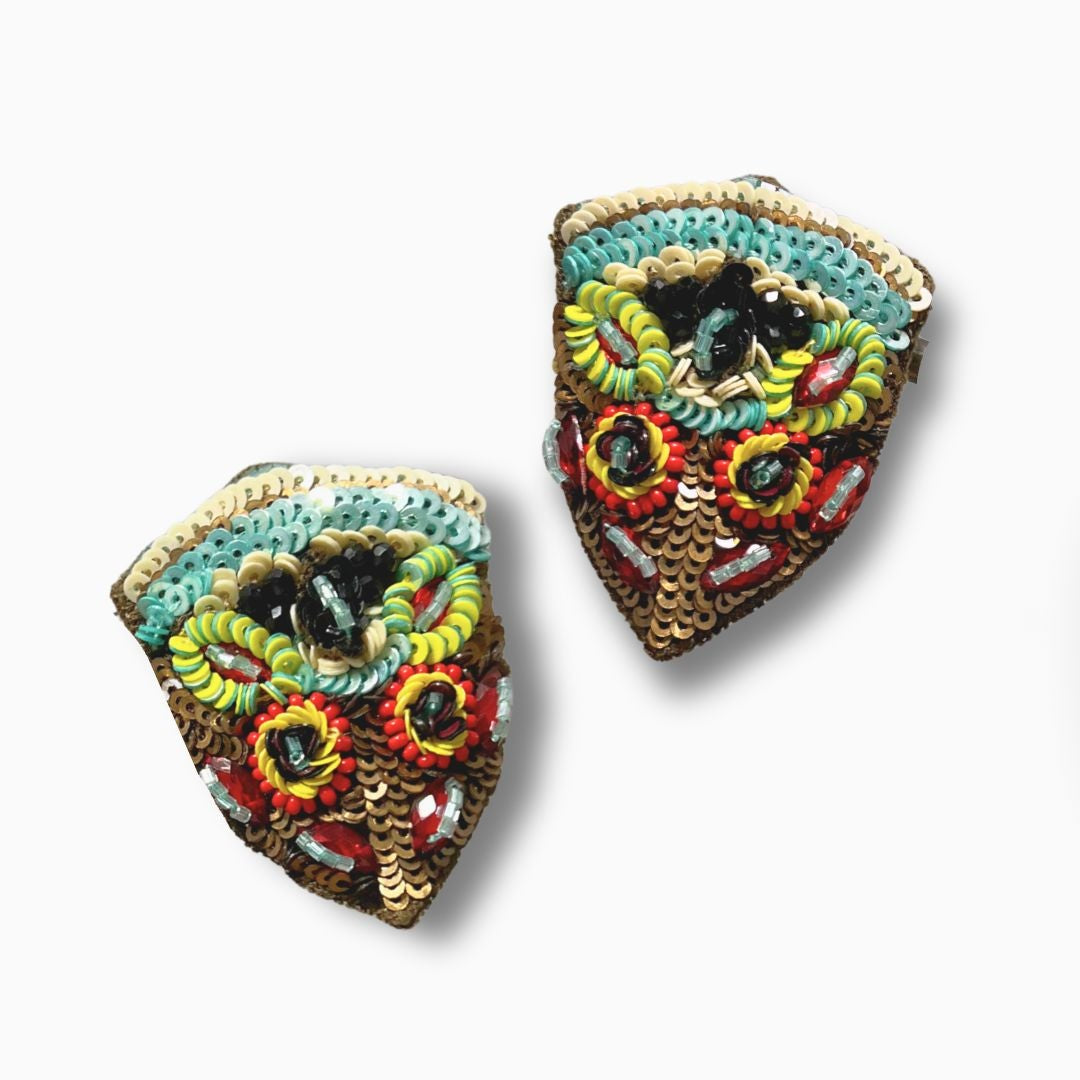 Colorful embroidered patches on a white background